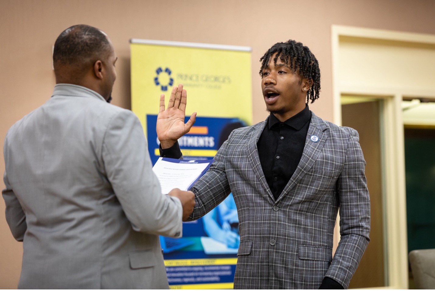 Makal Matthews being sworn in as SGA president.