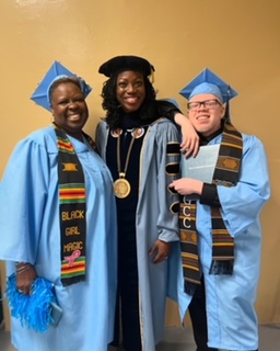 Aaron Wilson and his mother, Kellie Felder, smile with PGCC President Falecia D. Williams in their graduation gear at PGCC Commencement.