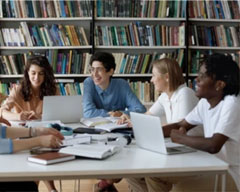 5 Students studying in a library