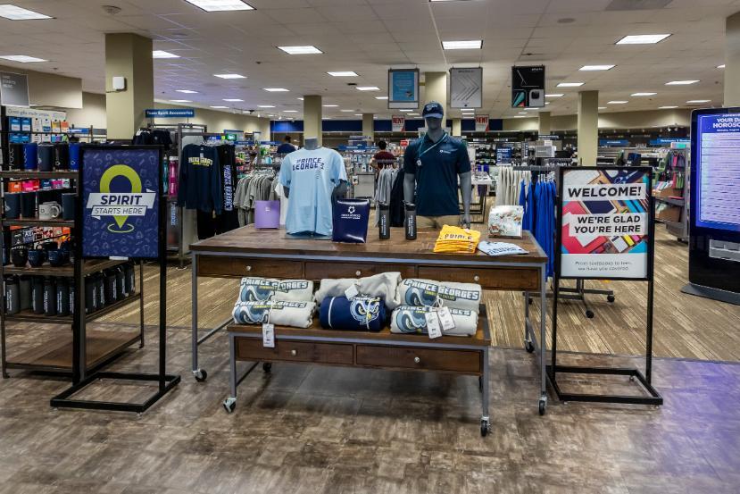 An interior shot of the PGCC bookstore with merchandise and PGCC-branded clothing on display.